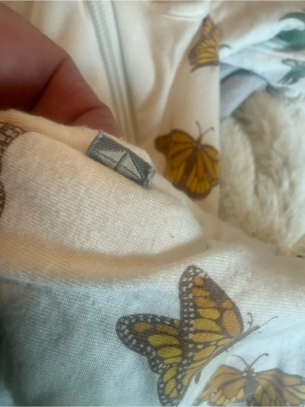 Kyte BABY monarch Cream Infant sleep sack with Subtle Gray Logo